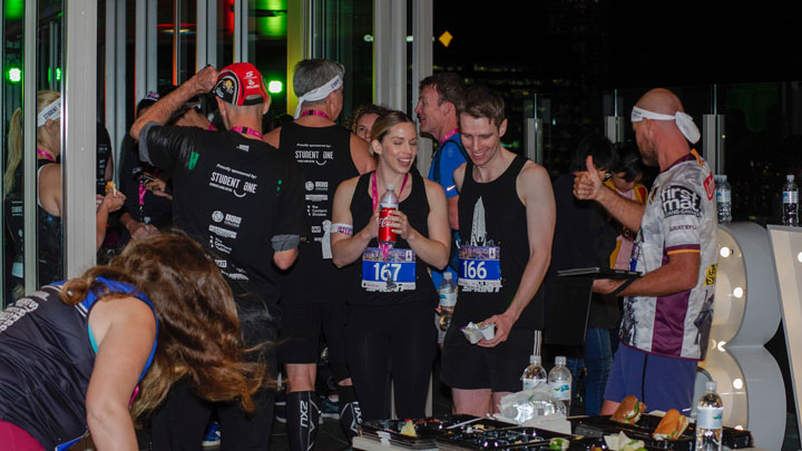 Participants enjoying food at the Brisbane Vertical Night Sprint